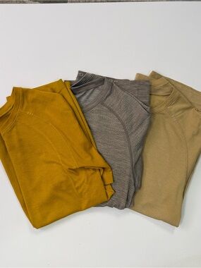 lululemon athletica men's long sleeve shirts in mustard, taupe, and tan